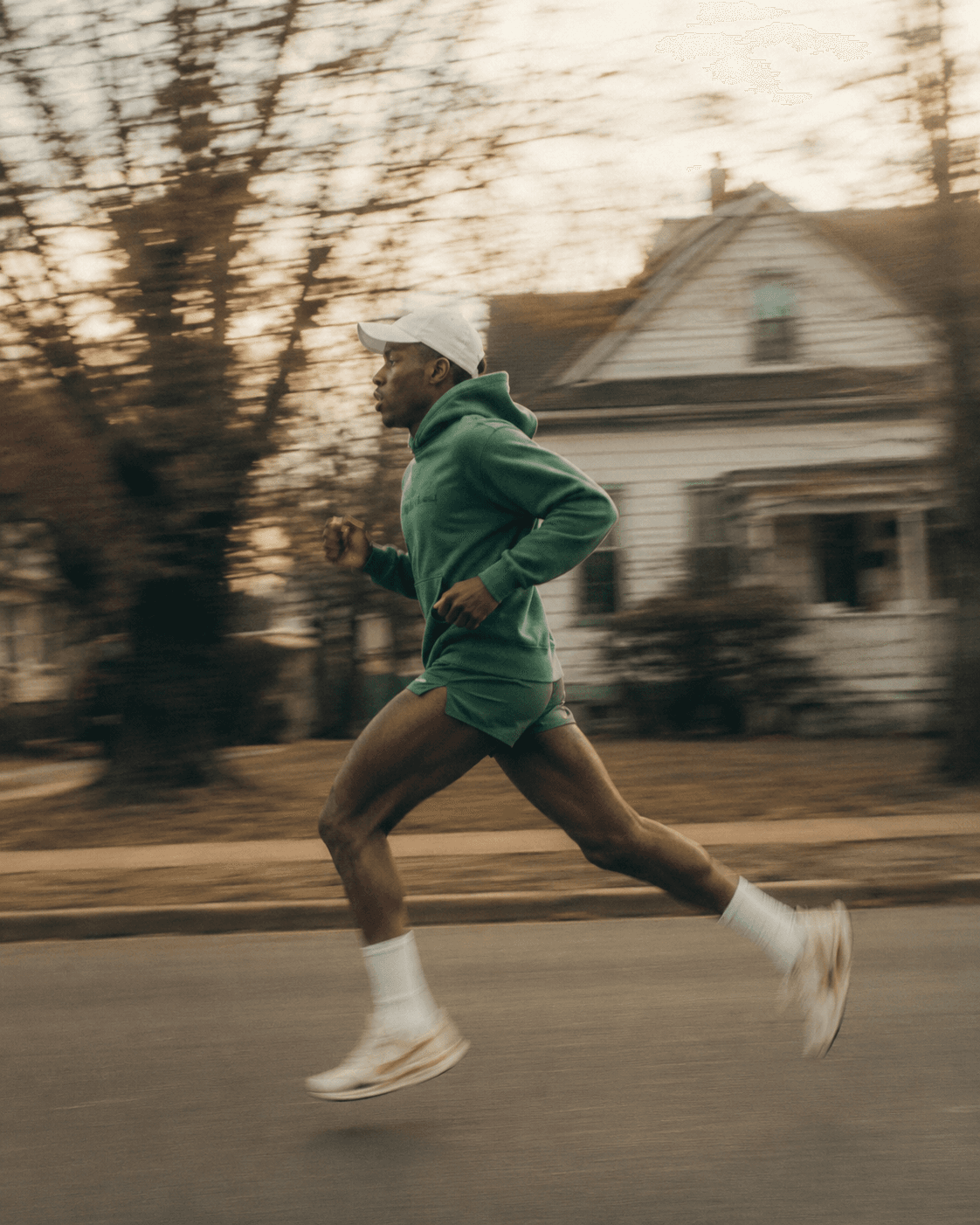 Runner on a warm suburban road
